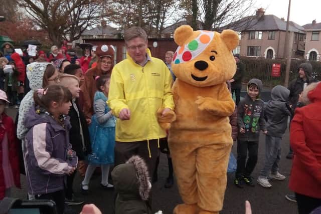 Pudsey Bear with BBC Radio Lancashire's Tim Padfield at Skerton St Luke's Primary School.