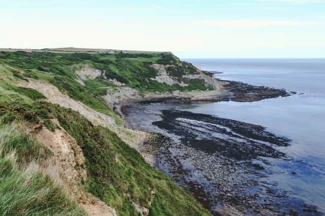 Port Mulgrave bay and jetty, North Yorkshire, UK. Viewed from the Cleveland Way walk from Runswick Bay to Staithes - a great dog walking area (photo: adobe)