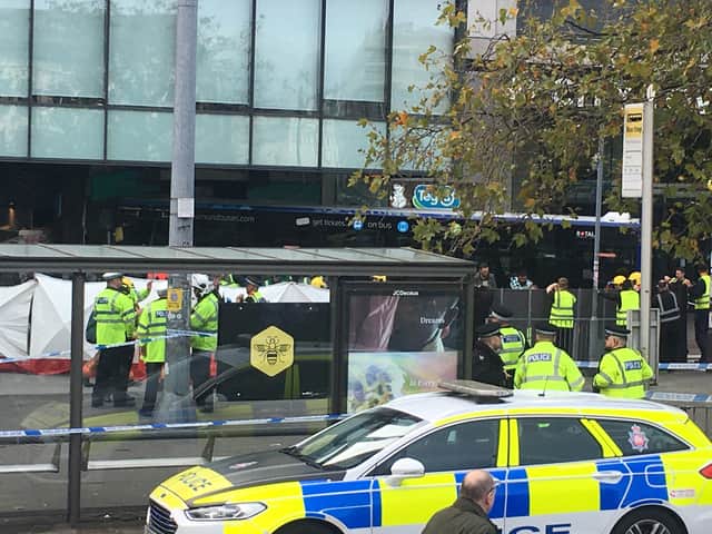 The scene in Piccadilly Gardens just after the crash on Monday lunchtime 