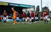 Morecambe applaud their fans after the weekend's FA Cup victory