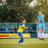 Charlie Bailey heads home Lancaster City's equaliser at Warrington Town