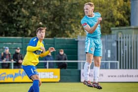 Charlie Bailey heads home Lancaster City's equaliser at Warrington Town