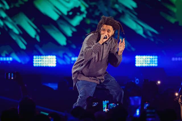 J. Cole performs onstage during the 2023 iHeartRadio Music Festival in Las Vegas.