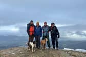 Anne with her husband and brothers in the Lakes.