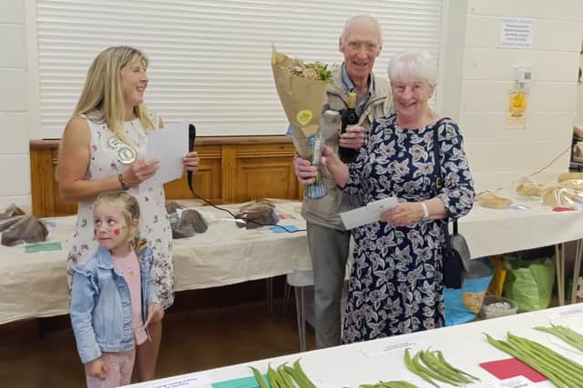 Barbara and Graham Creer receive their award.