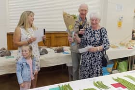 Barbara and Graham Creer receive their award.