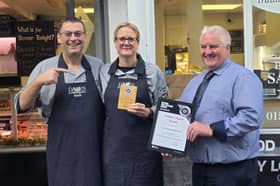 Mark and Fiona receiving their award outside Dales Traditional Butchers shop in Kirkby Lonsdale.