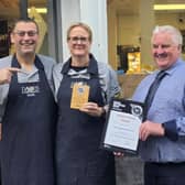 Mark and Fiona receiving their award outside Dales Traditional Butchers shop in Kirkby Lonsdale.