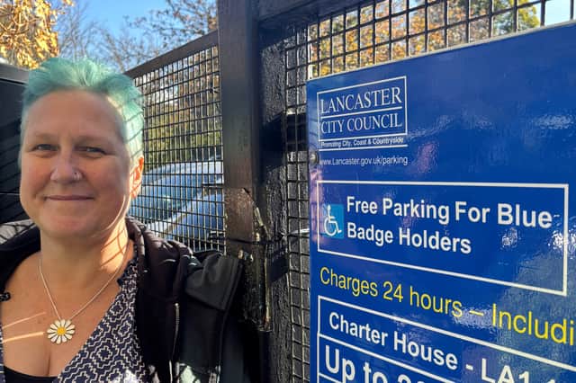 Green councillor and Disability Champion Abi Mills outside Charter House car park in Lancaster.