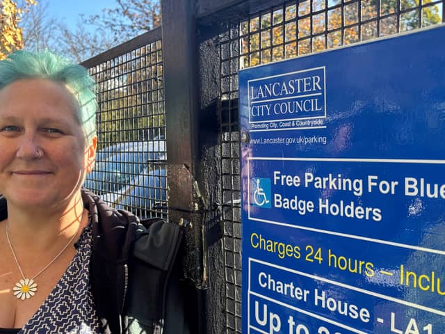 Green councillor and Disability Champion Abi Mills outside Charter House car park in Lancaster.