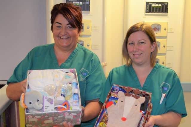 Assitant practitioners at the Huggett Suite, Jane Cassidy and Claire Thomson with some the shoeboxes donated for the appeal.