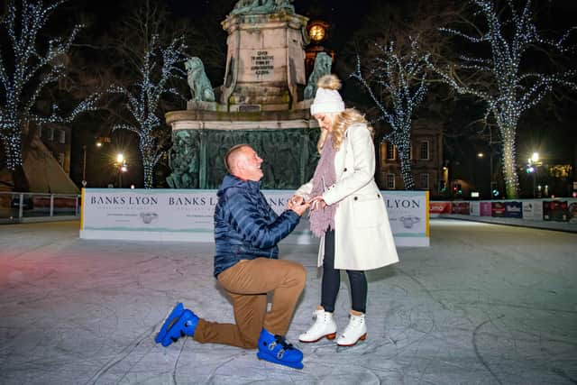 Stephen Gott proposes to Leah Palmer. Photo: Darren Robinson Photography.