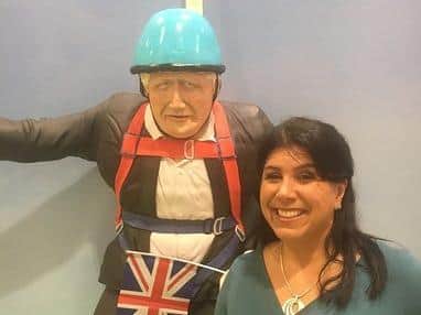 Rosie with her re-creation of Boris Johnson's aborted  zipwire journey