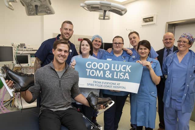 Dancing on Ice professional dancer Tom Naylor  gets the support from staff as he pays a visit to the Spire Fylde Coast Hospital in Blackpool, including his dad consultant Gerald Naylor [rear, right].... Picture Jason Roberts
