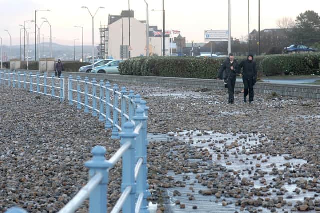 The aftermath of a storm surge on Morecambe prom.