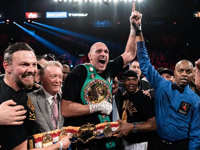 Tyson Fury celebrates his victory with his team. Picture: Ryan Haley/Premier Boxing Champions
