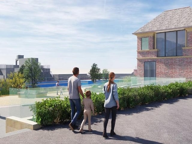 An artists impression of the revamped Grange Lido, in Grange-over-Sands, from Grange Promenade looking in to the newly-refurbished former lido looking towards the historic diving platform, with the entrance pavilion on the right