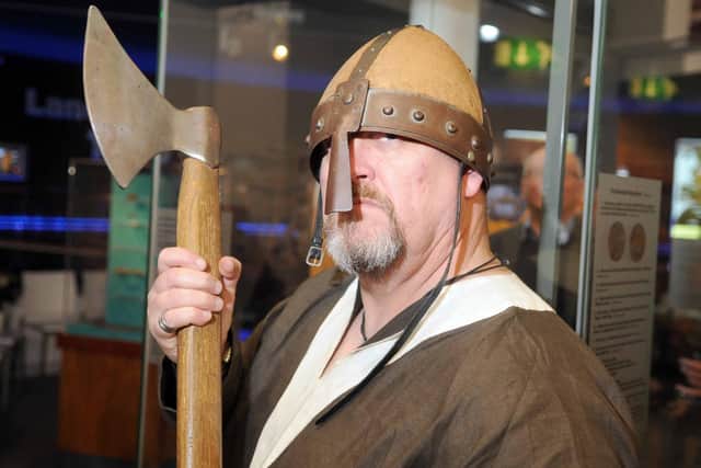 A Viking guards the Silverdale Hoard.