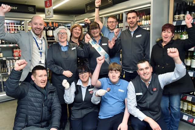 Co-op staff celebrate the relaunch of their new 1.3m Co-op store. Area Manager Gary Redpath, Michelle Piper, Store Manager Angela Clarke, Sandra Jeffs, Ryce McCall, Phil Brayshaw, Sharon Sill, Matt McLoughlin, Ben Williams, Abbie Cockerton, Steve Robshaw.