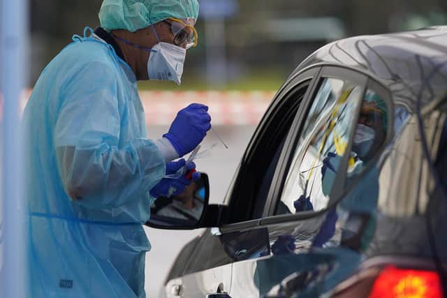 Coronavirus testing is taking place in people's cars