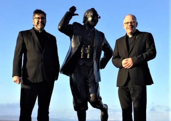 Father Damian (left) and Father Michael, pictured by the famous Eric Morecambe statue.
