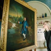 Steven Barber.  Taking a closer look at the painting by George Romney. Picture credit: National Trust/Steve Barber.