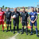 Chris and Dave Holt with the match officials before the Reece Holt Memorial Cup match. Photo by Chris Brown Photography.