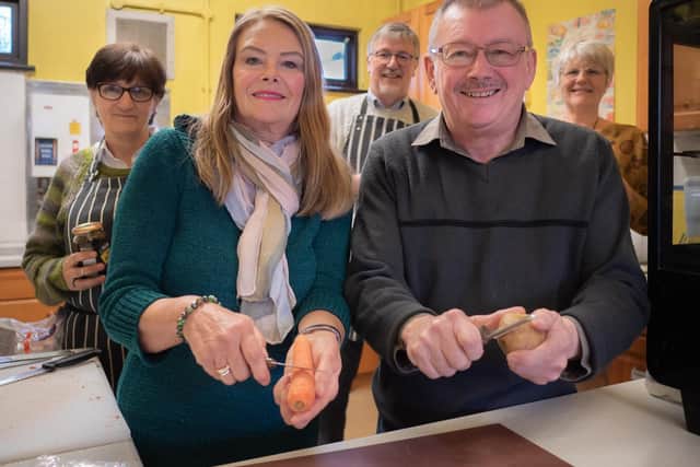 Barbara Walton and Alan Bleasdale using the knives their mum, Ada, had when a cook at the school kitchen, now Barton Road Centre.