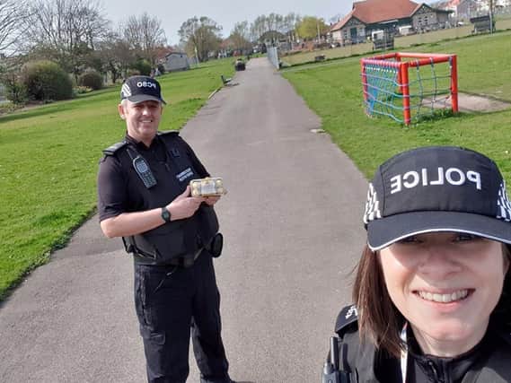 PCSO Smith (left) and PS Mitchell (right) received a gift from a member of the public while out on patrol in the West End of Morecambe. Photo: Lancaster Area Police.