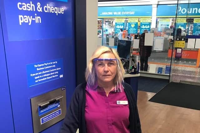 The face visors are being used by Halifax staff, including Elaine Ashton (pictured).
