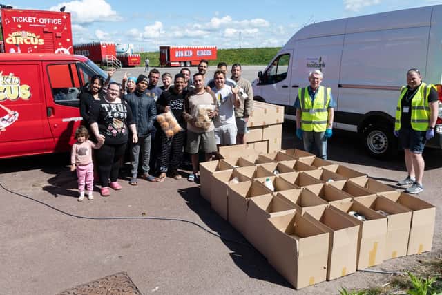 Some of the Big Kid Circus family, with Olympia Posirca front left, and the Morecambe Bay Foodbank delivery drivers.
