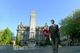 Ex-Army veteran Michael Nutter salutes the War Memorial and lays a wreath in preparation for the 11am two minutes silence to mark VE Day 75th anniversary