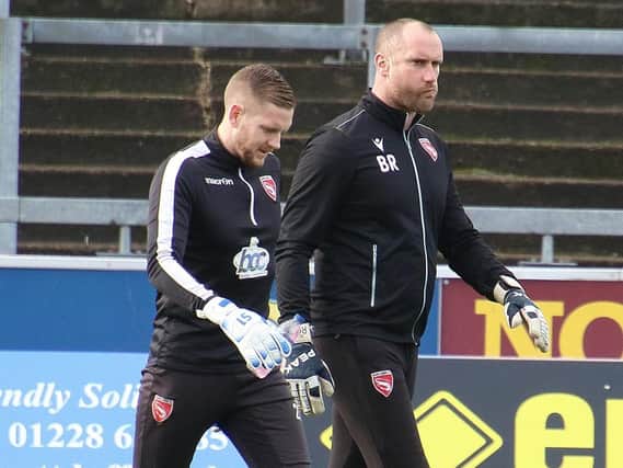 Morecambe goalkeeper coach Barry Roche, right, with Mark Halstead