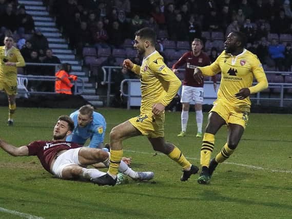 Morecambe's trips to clubs such as Northampton Town could be less frequent if regionalised football was reintroduced
