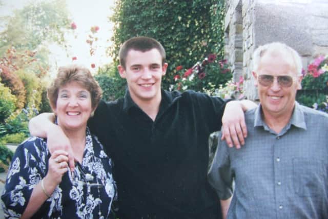 Anne and Peter Burrow with their son Edward.