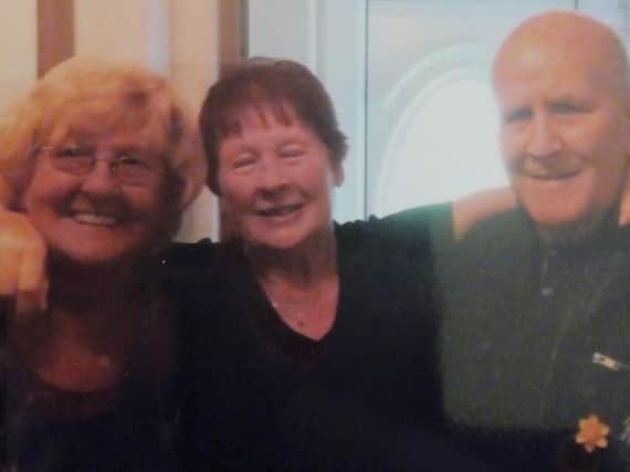 Christine (left), with sister Doreen and brother Len.