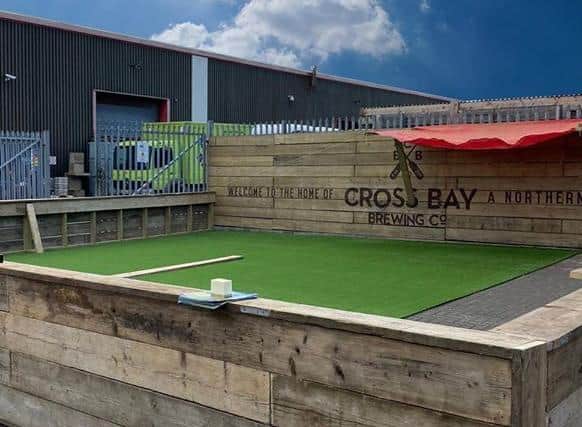 A new outdoor seating area being built at Cross Bay Brewhouse.