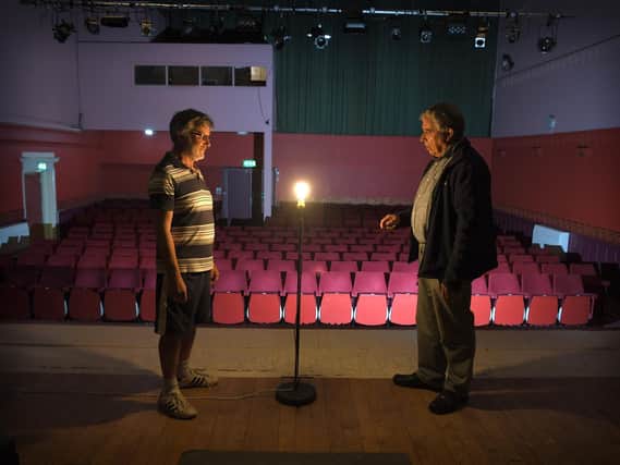 Dennis Yardley Chairman of Trustees of Preston Little Theatre and Allan Green of Preston Drama Club, with the ghost light at Preston Playhouse