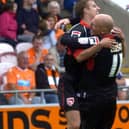 Andy Fleming and Kevin Ellison celebrate the former's goal against Blackpool
