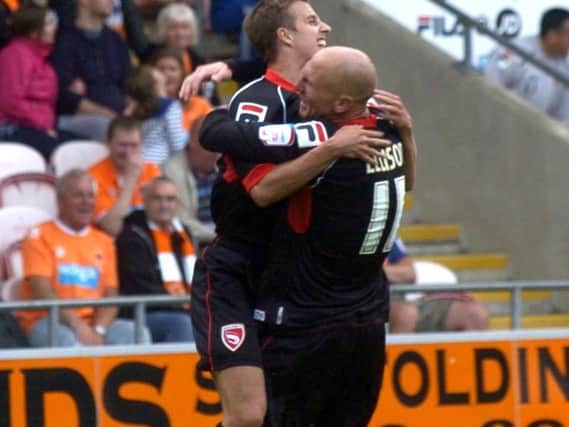 Andy Fleming and Kevin Ellison celebrate the former's goal against Blackpool