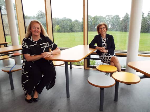 Sally Kenyon, left, with Liz Nicholls, retiring CEO of Bay Learning Trust.