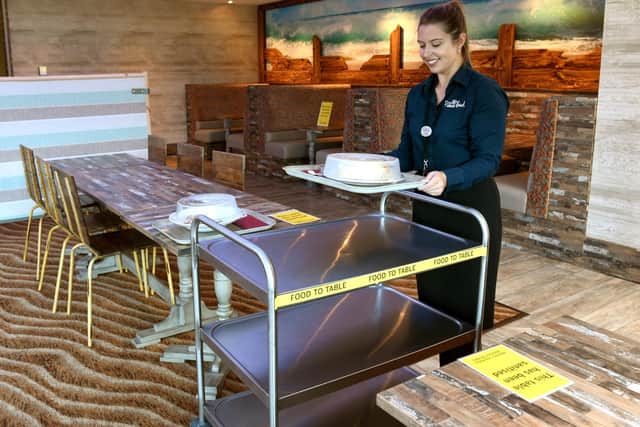 Preparing to welcome customers to The Ocean fish and chips restaurant
