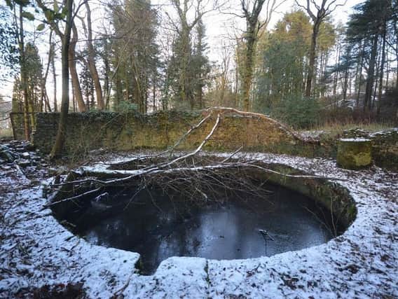 The water filled gas holder tank at Dolphinholme, the earliest known surviving examples of a gasworks in the world.
