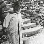 Collecting water at 'Slippy Slops'. (Riley Collection).