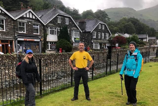 Jaclyn King-Gibson and Angela Richardson took part in the Defying Dementia Helvellyn Challenge. Pictured here with guide Sean Bolland from Adventure Trails they reached the summit in five hours despite challenging weather conditions.