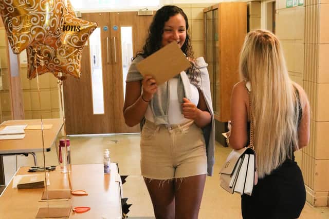 Morecambe Bay Academy pupils celebrate their A-level results.