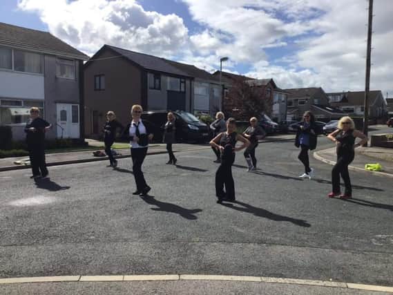 Dancers from the Alysia School of Dance treat their neighbours.