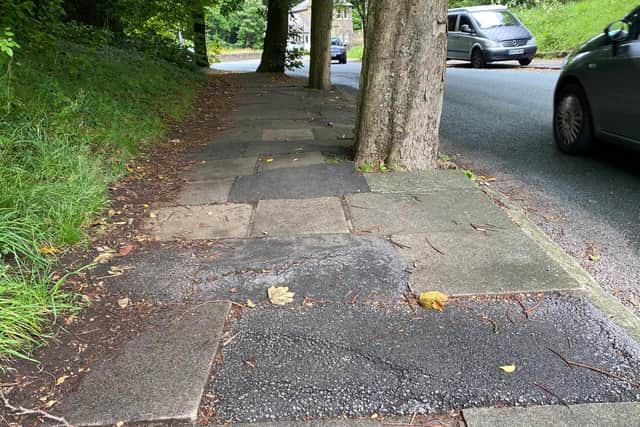 The pavement on Quernmore Road in Lancaster where Cameron Redpath was thrown out of his wheelchair after he hit an uneven paving slab.