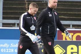 Morecambe goalkeeping coach Barry Roche is now passing on his knowledge