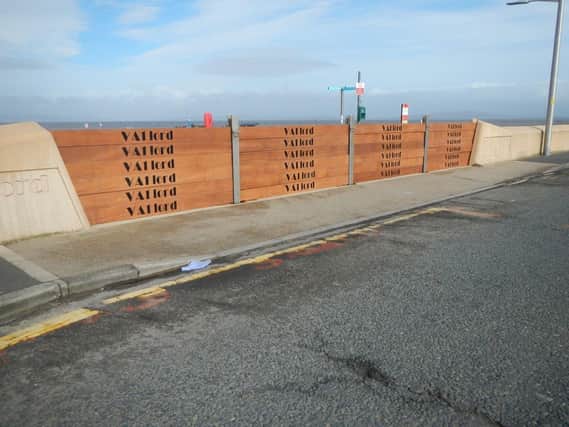 Lancaster City Council put up its storm boards along Morecambe promenade yesterday afternoon as a precaution.